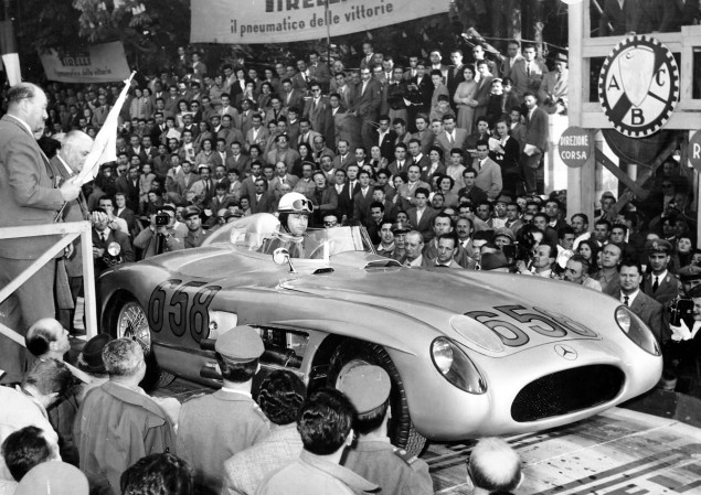 Juan Manuel Fangio (start number 658) in a Mercedes-Benz Model 300 SLR racing sports car Juan Manuel Fangio (start number 658) in a Mercedes-Benz Model 300 SLR racing sports car just before the start of the 1955 Mille Miglia.
