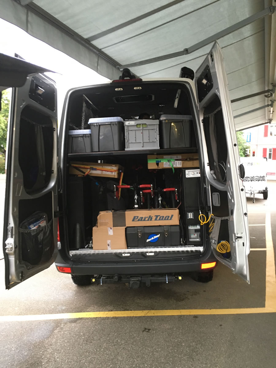 Bikers ride their Specialized S-Works nearly 5,000 miles across Europe for disadvantaged children. Part of the tour a, Mercedes-Benz Sprinter as support vehicle